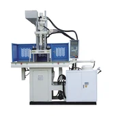 Macchina per stampaggio a iniezione a doppia slitta